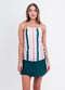 Girl wearing striped spaghetti strap swim top with dark jade wrap swim skirt