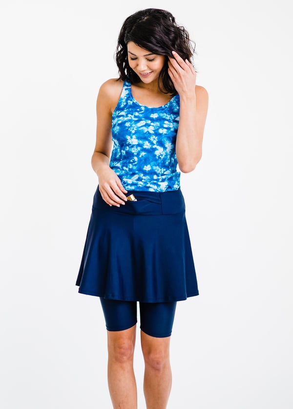 Swim top and skort with a pocket. Modest plus size top and skirt with pants. Womens' modest plus size swim set. Sun protection UPF +50
