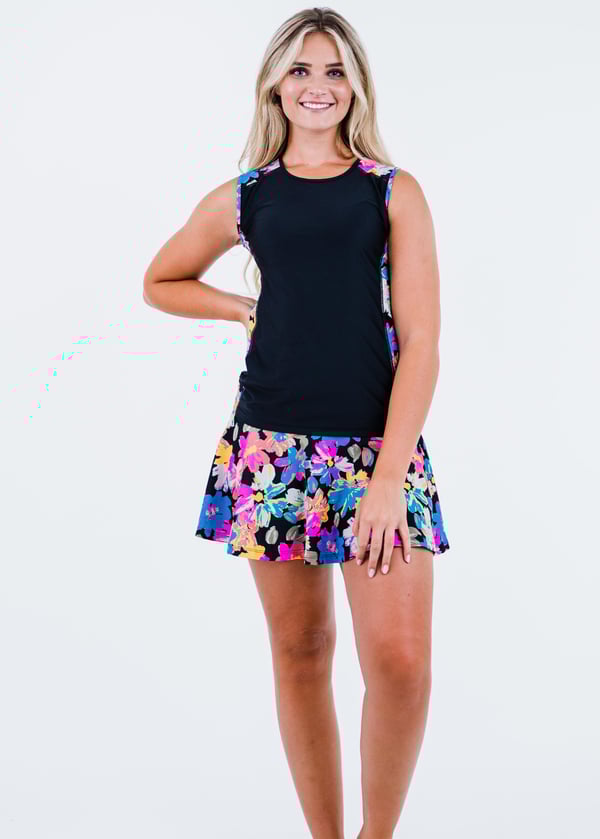 Loose swim top and flowy skort. Modest plus size top and skirt with pants. Womens' modest plus size swim set. Sun protection UPF +50.