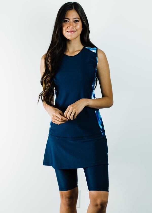 Loose swim top and skort. Modest plus size top and skirt with pants. Womens' modest plus size swim set. Sun protection UPF +50.