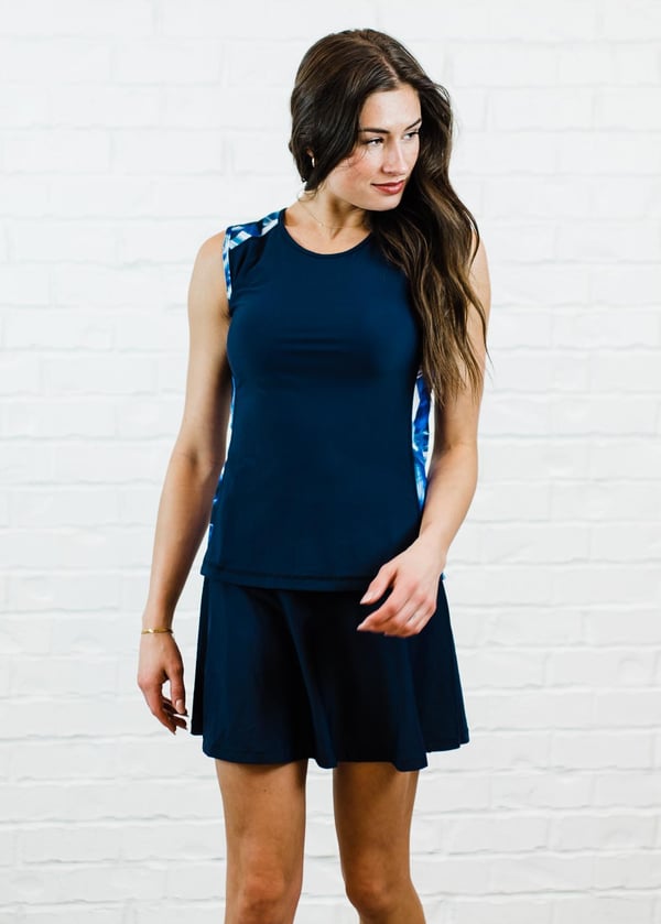 Loose swim top and flowy skort. Modest plus size top and skirt with pants. Womens' modest plus size swim set. Sun protection UPF +50.